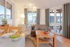  Ferienwohnung Auszeit nur 100 m zum Strand mit Balkon Ahlbeck - Wohnzimmer