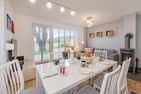  Ferienhaus Anemone mit Kamin und großer Sonnenterrasse Korswandt - Wohnzimmer