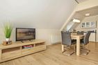 Uns Schilfhus App. Atelier mit großen Balkon und nur 100 m zum Strand Heringsdorf - Wohnzimmer