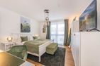  Ferienwohnung Ostseebude mit Balkon und nur 800 m zum Strand Kölpinsee - Schlafzimmer