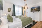  Ferienwohnung Ostseebude mit Balkon und nur 800 m zum Strand Kölpinsee - Schlafzimmer