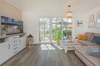  Ferienhaus MeerSeenSucht mit Sauna, Terrasse und Grill Korswandt - Wohnzimmer
