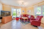  Ferienhaus Neptun Ostseebad Karlshagen - Wohnzimmer