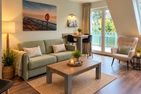  Ferienwohnung Fördebeach Solitüde Flensburger Förde - Wohnzimmer