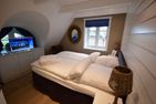 Haus der Gezeiten Ebbe Nebel/Süddorf - Boxspringbett, TV