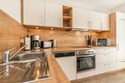  Ferienwohnung Klippenblick mit Sauna, Kinderspielbereich und Fitnessraum Zirchow An der Haffküste - Küche / Küchenzeile