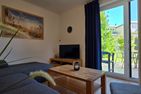  Ferienwohnung KWF-4a EG Graal-Müritz Küstenwald - Wohnzimmer