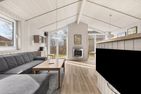  Ferienhaus Baltic Aloha Hus Grömitz Ostholstein - Wohnzimmer
