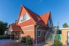  Das Posthaus - Kutsche Greetsiel - Hauptansicht