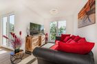 Ferienwohnung Pia mit Fitness, Sauna  und Freizeitbereich Zirchow An der Haffküste - Wohnzimmer