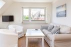  Haus Watthus - Wohnung Himmel Nebel - Wohnzimmer in der Ferienwohnung "Himmel"