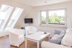  Haus Watthus - Wohnung Himmel Nebel - Wohnzimmer mit neuer Fensterfront mit Blick auf das Watt