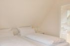  Haus Watthus - Wohnung Himmel Nebel - Schlafzimmer 1 in der Ferienwohnung "Himmel"