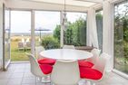  Haus Watthus - Wohnung Paradies Nebel - WIntergarten mit Esstisch in der Ferienwohnung "Paradies" im Watthus
