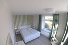 Haus Kerrin Traumwohnung mit Meerblick und Strandkorb Wittdün - Schlafzimmer
