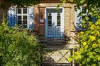  Haus zu den Büschen 02 Ostseebad Wustrow - Fassade / Eingang