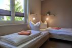  Ferienwohnung KWF3aOG Graal-Müritz Küstenwald - Schlafzimmer