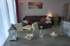  Ferienwohnung KWV 7 EG Graal-Müritz Küstenwald - Wohnzimmer