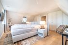  Meggis Hüs Süderende - Das dritte Schlafzimmer befindet sich ebenfalls im Obergeschoss und besticht zum einen mit der eleganten Raumaufteilung,