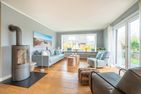  Haus Westerheide Nieblum - Der Ofen sorgt für eine wohlige Atmosphäre.