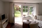 Haus Anneliese Bungalow Düne Norddorf auf Amrum - Wohnzimmer der Ferienwohnung Düne in Norddorf auf Amrum