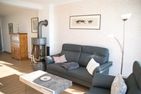 Haus Kap Hoorn Ferienwohnung Passat Wittdün auf Amrum - Wohnzimmer mit Kaminofen in der Ferienwohnung Passat im Haus Kap Horn in Wittdün auf Amrum