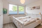 Ferienhaus Glockenstraße Ferienwohnung Ostseehöhe Appartement 2 Scharbeutz - Schlafzimmer