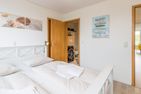 Ferienhaus Glockenstraße Ferienwohnung Ostseehöhe Appartement 2 Scharbeutz - Schlafzimmer