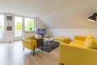 Ferienhaus Glockenstraße Ferienwohnung Ostseehöhe Appartement 2 Scharbeutz - Wohnzimmer
