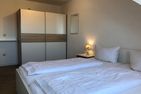  Ferienwohnung Sonnenlicht Norderney - Schlafzimmer