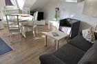  Ferienwohnung Sonnenlicht Norderney - Wohnzimmer