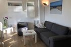  Ferienwohnung Sonnenlicht Norderney - Wohnzimmer