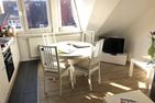  Ferienwohnung Sonnenlicht Norderney - Wohnzimmer