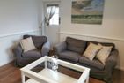 Haus Bootsmann Kapitän Nebel/Süddorf - Wohnzimmer