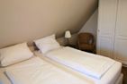Haus Bootsmann Kapitän Nebel/Süddorf - Schlafzimmer