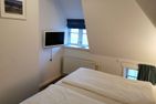 Haus Bootsmann Kapitän Nebel/Süddorf - Schlafzimmer