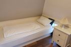 Haus Bootsmann Kapitän Nebel/Süddorf - Schlafzimmer