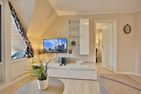 Ferienhaus Wohldstraße 6 a Ferienhaus Wohldstr.6a Appartement 18 Timmendorfer Strand - Wohnzimmer