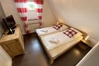  Ferienhaus Weitblick Ostfriesland - Schlafzimmer