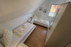Haus Seeigel Ferienwohnung Strandflieder Norderney - Schlafzimmer