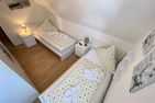 Haus Seeigel Ferienwohnung Strandflieder Norderney - Schlafzimmer