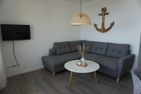 Vier Jahreszeiten 4JZ Haus 2 Whg. 76 Lübecker Bucht - Wohnzimmer