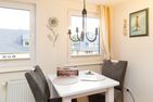 Kleine Perle auf Amrum Norddorf - Esstisch in der Ferienwohnung Kleine Perle
