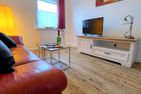  Ferienhaus Carpe Diem Ostfriesland - Wohnzimmer