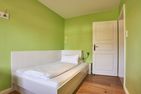  Green Garden Wohnung 1 Wyk auf Föhr - Das dritte Schlafzimmer verfügt über ein Queen-Size-Bett.