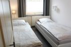  Ferienwohnung *Meeresleuchten* Wittdün auf Amrum - Schlafzimmer 1 der Ferienwohnung Meeresleuchten in Wittdün auf Amrum