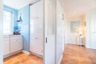 Liv Hus Wyk auf Föhr - Über eine Schiebetür lässt sich die Küche von Wohn-/Esszimmer trennen.