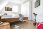  Ferienhaus Schilfrohrsänger 36 Fuhlendorf - Schlafzimmer