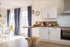  Ferienhaus Schilfrohrsänger 6 Fuhlendorf - Küche / Küchenzeile