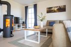  Ferienhaus Schilfrohrsänger 6 Fuhlendorf - Wohnzimmer